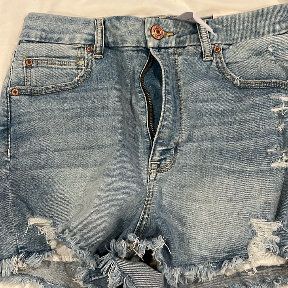Never worn, tags attached American Eagle jean shorts size 12